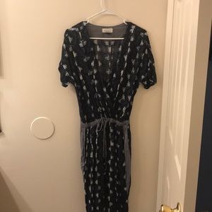 Navy blue jumpsuit with cute pattern.